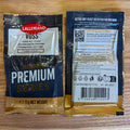 Two Lallemand Voss Kveik Ale Yeast packets shown side by side on a wooden surface, displaying both the front and back packaging details.
