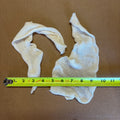 A pair of off-white small muslin bags measuring 5”x15”, displayed on a brown background with a yellow tape measure underneath for scale.
