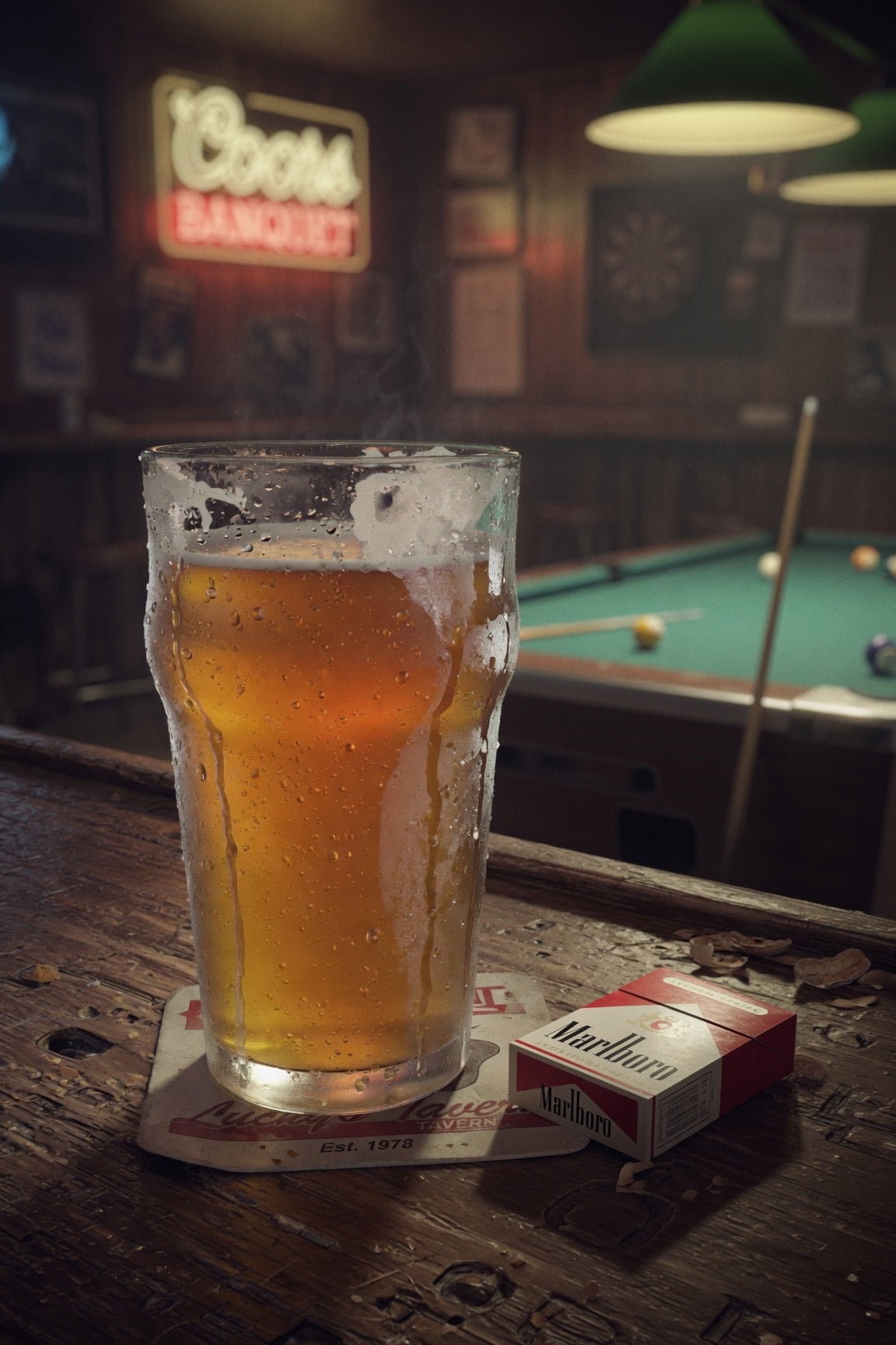 a pint of pale beer on a wooden bar in a dimly lit dive bar with a pool table and comet hops
