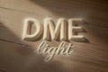 powder on a wooden table that reads DME light with proximity dry malt extract