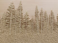 kernels of light colored barley arranged to look like a pine forest on a wooden surface with root shoot malting genie pilsner base malt