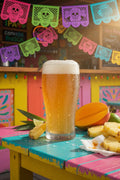 a vibrant color shot of a pint of pale beer in a mexican themed taproom with sabro hops
