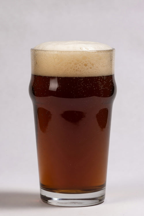glass of deep amber brown beer showing 26 srm color from simpsons amber specialty malt
