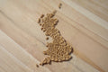 a cluster of simpsons maris otter base malt arranged in the shape of the UK showing 2.2 degrees lovibond